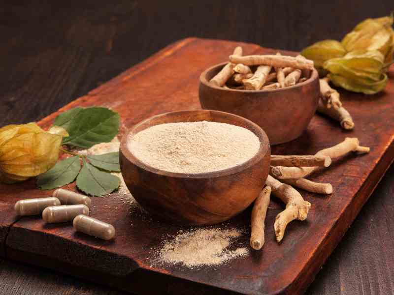 Photo: A tray of Ashwagandha root ground and in capsules.